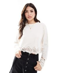 Miss Selfridge - Long Sleeve Lace Hem Detail Top - Lyst