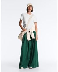 Oysho - Cotton Wide-leg Pique Pleated Trousers - Lyst