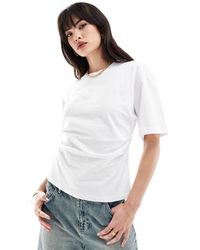 ASOS - T-shirt bianca con vita a corsetto - Lyst