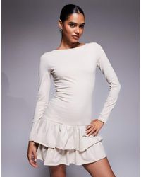 Fashionkilla - Vestido Corto De Manga Larga Con Cintura Baja Y Volante En El Bajo De Algodón De -Blanco - Lyst