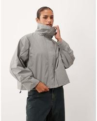 Lioness - Shoreline Funnel Neck Oversized Utility toggle Windbreaker Jacket - Lyst