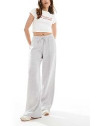 Stradivarius - Broek Van Kreukelstof Met Linnenlook En Elastische Taille - Lyst