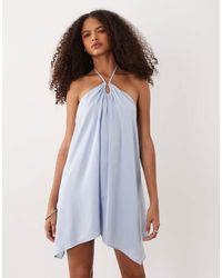 SNDY'S - Halterneck Asymmetric Drape Low Back Mini Dress - Lyst
