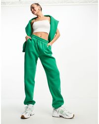 The Couture Club - Joggers oversize verdi con logo tono su tono - Lyst