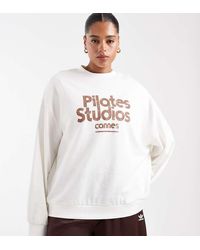 ASOS - Asos Design Curve Oversized Sweatshirt With Pilates Studio Graphic - Lyst