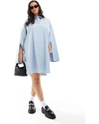 ASOS - Asos design curve - robe chemise oversize à rayures avec double poche - bleu - Lyst