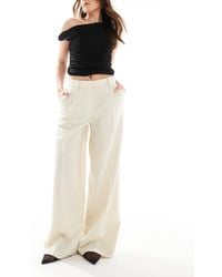 Monki - Pantalon ample à taille haute et plis devant - beige - Lyst