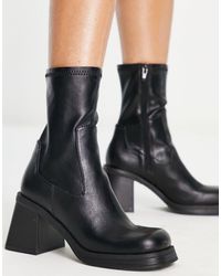 ASOS - Botas negras estilo calcetín con tacón medio reversed - Lyst