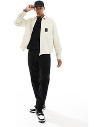 Armani Exchange - Camicia giacca ampia beige con zip sul davanti ed etichetta del logo sulla tasca - Lyst
