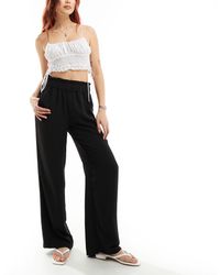 Jdy - High Waisted Wide Leg Trousers With Frill Waistband - Lyst