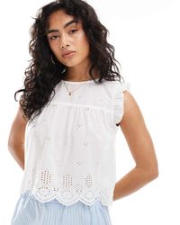 ONLY - Top en maille pointelle avec manches à volants - Lyst