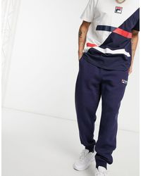 Pantalones de chándal Fila de hombre: hasta el 73 % de descuento | Lyst