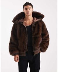 ASOS - Chaqueta Extragrande Con Capucha De Piel Sintética De - Lyst