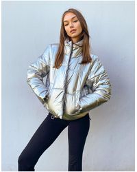 Reebok Plumífero plateado Training - Azul