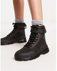 Dr martens – farylle – robuste schwarze lederstiefel mit schleife top