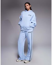 Kaiia - Cotton Rich Embroidered Logo Contrast Stripe Detail Wide Leg joggers Co-ord - Lyst