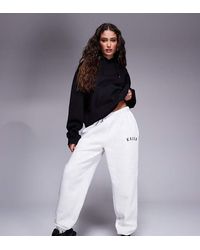 Kaiia - Petite Embroidered Logo Cuffed Joggers - Lyst