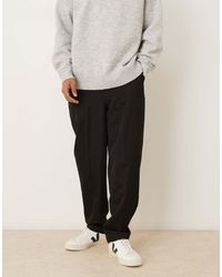 ASOS - Pantalones De Vestir Negros De Corte Tapered Holgado Con Parte Elástica En La Cinturilla De - Lyst