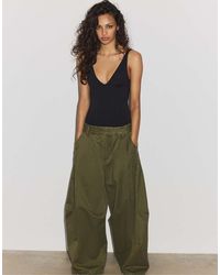 Stradivarius - V-Neck Bodysuit - Lyst