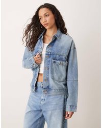 Calvin Klein - Veste en jean avec imprimé éclaboussures - clair délavé - Lyst