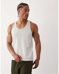 4505 - Lightweight Performance Seamless Mesh Running Tank Top - Lyst