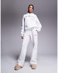 Kaiia - Joggers Grises De Pernera Ancha Con Logo Bordado Y Detalle De Lazo En La Cinturilla De (Parte De Un Conjunto) - Lyst