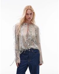 TOPSHOP - Ruffle Sleeve Sheer Tie Front Top - Lyst