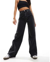 Tommy Hilfiger - Vaqueros Negros De Talle Alto Y Pernera Ancha Claire De - Lyst