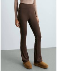Oysho - High Rise Warm Flare Trousers With Zips - Lyst