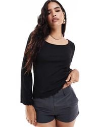 Vila - Ribbed Long Sleeve Scoop Neck Top With Lettuce Edge Detail - Lyst