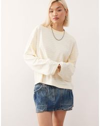 Lioness - – bloom – langärmliges, kastiges t-shirt aus baumwollmix mit rundhalsausschnitt und streifen - Lyst