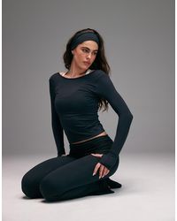 4505 - Plush Handle Scoop Back Layering Long Sleeve - Lyst