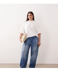 ARRANGE - Curve Clover Front Seam Detail Jeans - Lyst