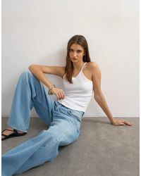 TOPSHOP - Rib Spaghetti Strap Curve Hem Vest - Lyst