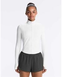 Oysho - Short Light Touch Technical Jacket - Lyst