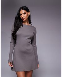 Kaiia - Robe pull courte en maille à col montant et manches évasées - mocha - Lyst