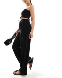 New Look - Pantaloni A Fondo Ampio Stropicciati Neri - Lyst