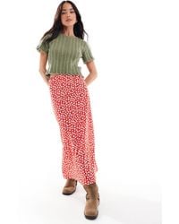 Wednesday's Girl - Jupe longueur mollet coupée en biais à petites fleurs - Lyst
