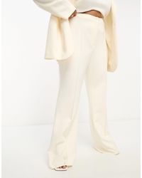 ASOS - Curve - pantaloni da abito a zampa color crema - Lyst