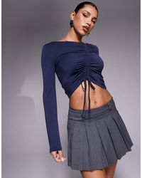 ASOS - Top doux au toucher à manches longues et amples avec fronces asymétriques à l'avant - encre - Lyst
