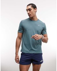 Nike - Camiseta Con Protección Uv Miler Dri-Fit De - Lyst
