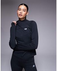 New Balance - Chaqueta Negra Entallada Con Cremallera Harmony De - Lyst