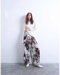 TOPSHOP - Pantaloni Stropicciati A Fondo Ampio Con Stampa Pezzata - Lyst