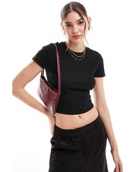 ONLY - T-Shirt Mini Aderente Nera - Lyst