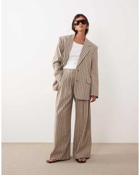 ARRANGE - Pleated Wide Leg Pants - Lyst