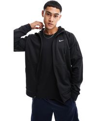 Nike - Sudadera negra con capucha therma-fit - Lyst