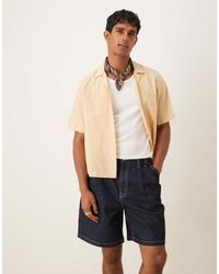 ASOS - Pantalones Cortos Vaqueros De Corte Alargado Medio Con Lavado Crudo Y Dos Pinzas De -Azul - Lyst