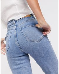 Stradivarius Jean mom stretch coupe slim en coton biologique - délavé - Bleu