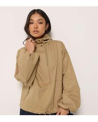 PixieGirl - Petite Half Zip Hooded Windbreaker Jacket - Lyst