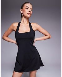 4505 - Active Halter Neck Tennis Dress With Under Shorts - Lyst